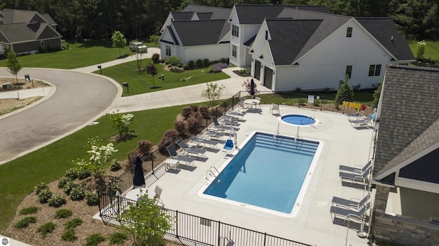 203 Vineyard Ridge Dr Unit 38, Traverse City, MI 49686 - pool with a yard, a patio area, and fence