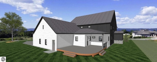 rear view of property with a yard