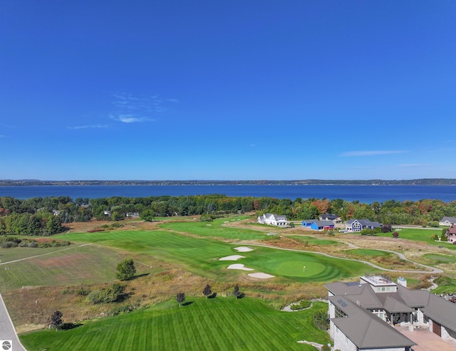 bird's eye view of a large body of water and a golf club