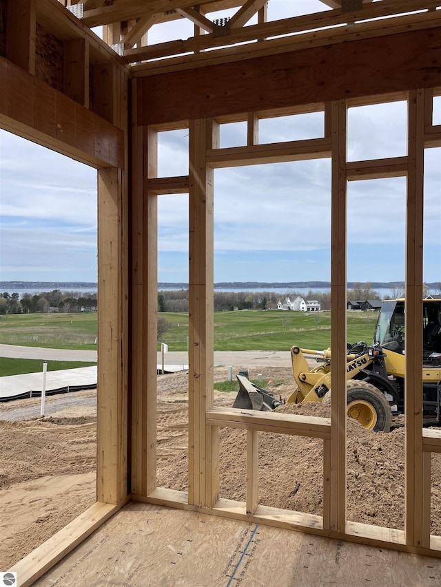 sunroom featuring view of golf course