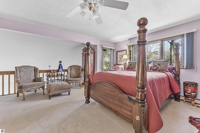 bedroom with carpet and multiple windows