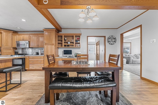 dining area featuring recessed lighting, crown molding, baseboards, light wood-style flooring, and a notable chandelier