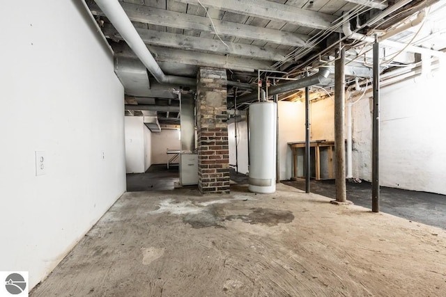 unfinished basement with gas water heater