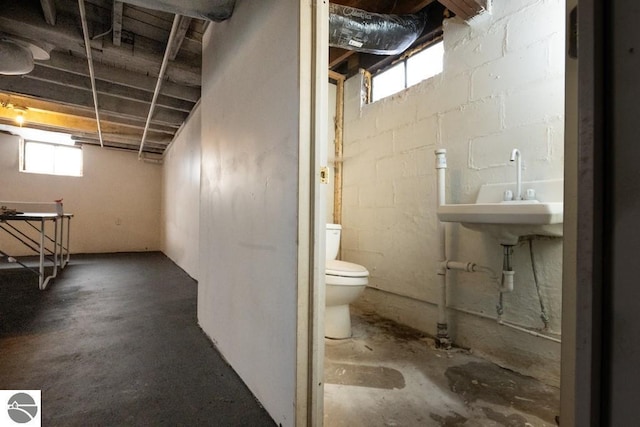 interior space featuring concrete block wall