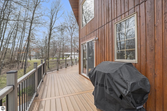 2000 Granada Ct, Weidman, MI 48893 - wooden deck featuring a grill