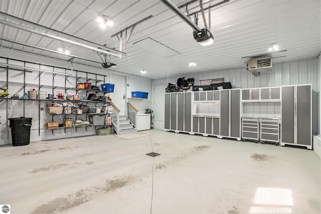 2000 Granada Ct, Weidman, MI 48893 - garage with a garage door opener