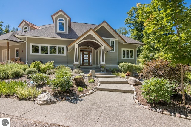 4201 N High Bluffs Dr, Leland, MI 49654 - view of front of house with roof with shingles