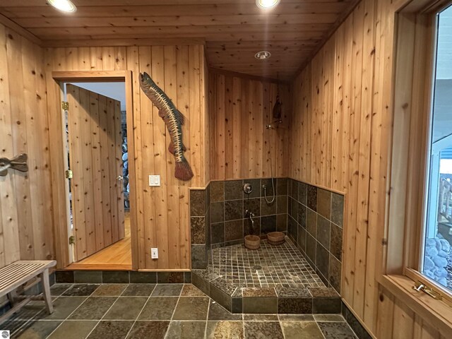 1995 San Marino Trl, Kewadin, MI 49648 - interior space with wood walls and recessed lighting