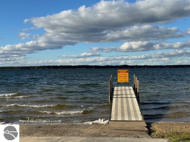 1900 Pavilion Dr, Lake City, MI 49651 - view of dock featuring a water view