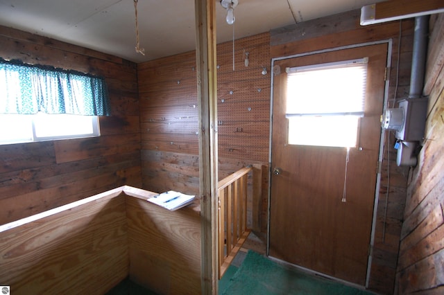 5525 S Mccauley Rd, Alger, MI 48610 - entryway featuring wood walls