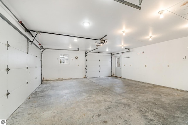 7888 E Broomfield Rd, Mount Pleasant, MI 48858 - garage with a garage door opener