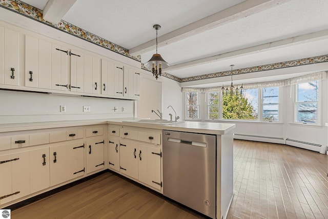 kitchen featuring a notable chandelier, a peninsula, stainless steel dishwasher, baseboard heating, and wood finished floors