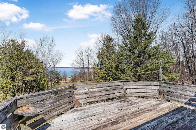 wooden deck with a water view
