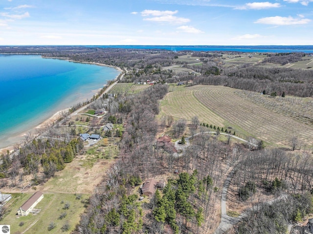 aerial view featuring a rural view and a water view