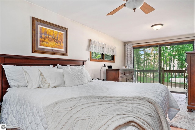 bedroom with access to exterior and ceiling fan