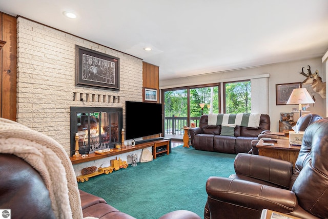 living room featuring recessed lighting, carpet flooring, and a brick fireplace
