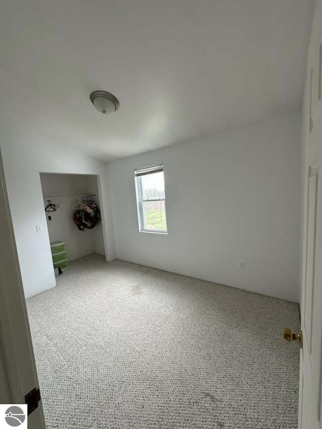 unfurnished bedroom featuring carpet