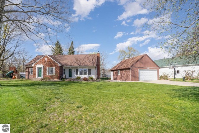 1016 Argyle Ct, Alma, MI 48801 - ranch-style house with a chimney, an outdoor structure, driveway, a detached garage, and a front yard