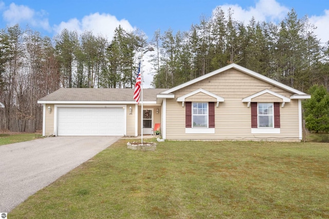 3193 Crimson Ranch Ln, Traverse City, MI 49685 - ranch-style house featuring driveway, a front yard, and a garage