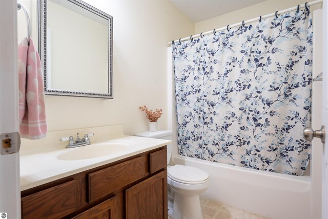 3193 Crimson Ranch Ln, Traverse City, MI 49685 - full bathroom with shower / bath combo, toilet, and vanity