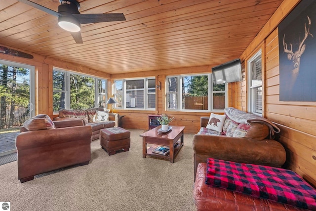 6836 NW Aarwood Trl, Rapid City, MI 49676 - sunroom featuring carpet floors, plenty of natural light, and wood ceiling