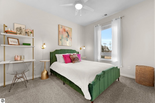 carpeted bedroom with a ceiling fan, baseboards, and visible vents