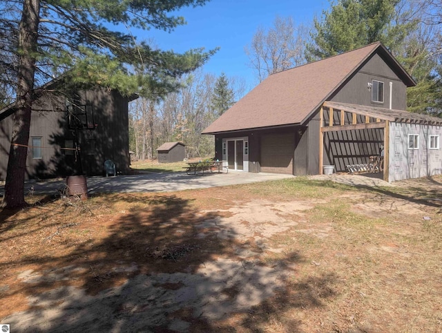 exterior space featuring dirt driveway