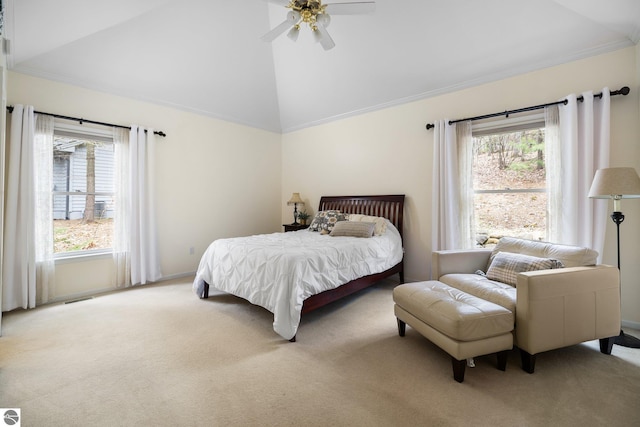 bedroom featuring multiple windows, visible vents, and light colored carpet