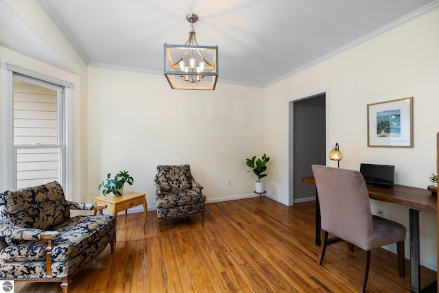 office space featuring crown molding, baseboards, an inviting chandelier, and hardwood / wood-style floors