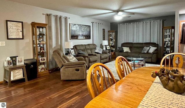 dining area featuring ceiling fan and wood finished floors