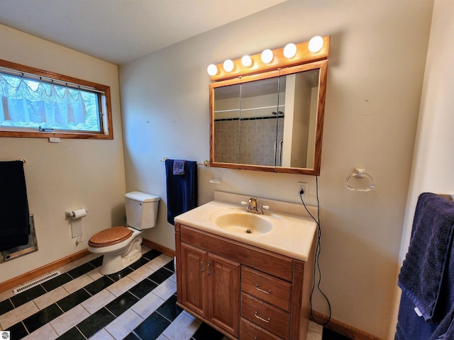full bath with visible vents, vanity, toilet, baseboards, and tile patterned floors
