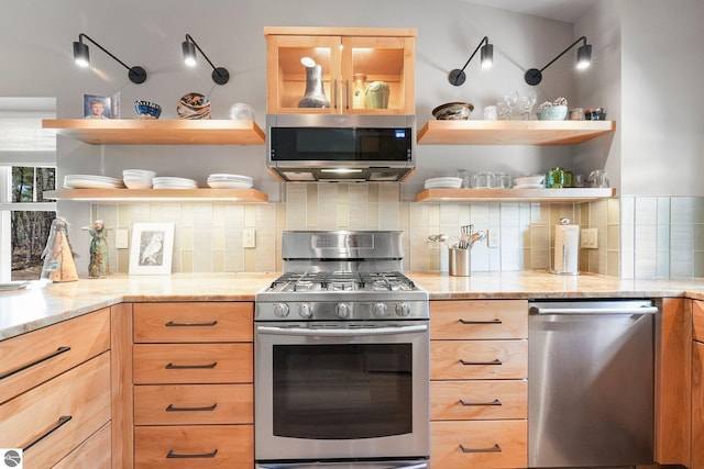 kitchen featuring open shelves, decorative backsplash, light brown cabinetry, and stainless steel appliances