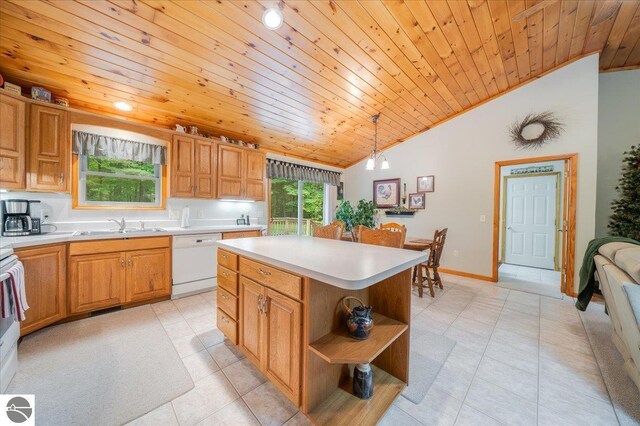 kitchen featuring light countertops, wood ceiling, dishwasher, and vaulted ceiling