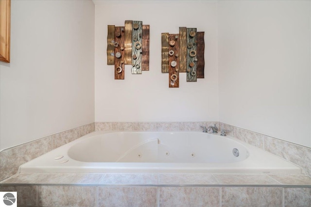 full bath featuring a jetted tub