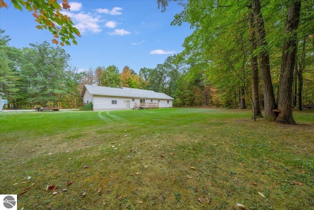 view of yard with a deck