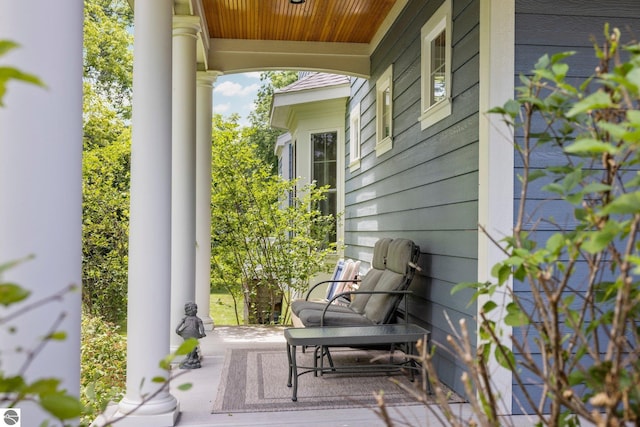 view of patio featuring a porch