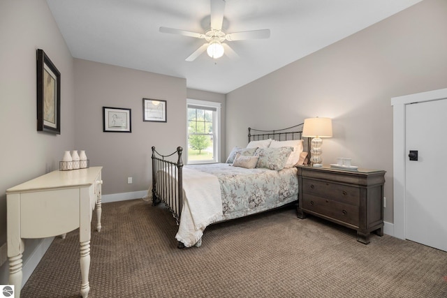 carpeted bedroom featuring baseboards and a ceiling fan
