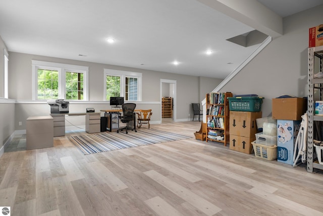 office space with recessed lighting, baseboards, and light wood finished floors