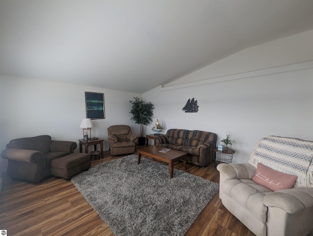 living room with vaulted ceiling and dark wood-style floors