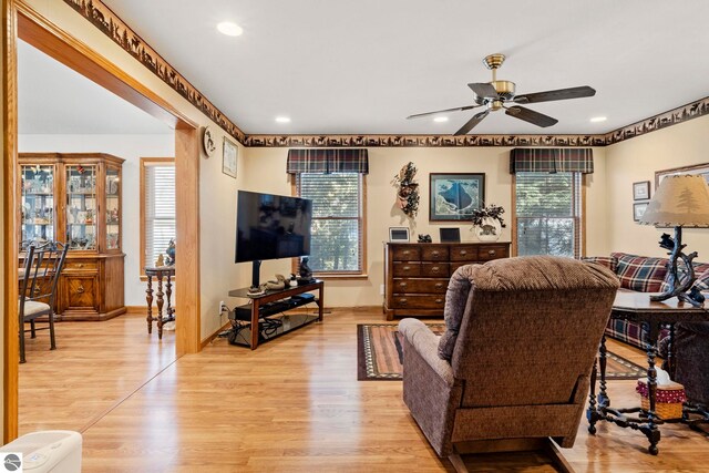 5449 E Shore Dr NE, Kalkaska, MI 49646 - living area featuring ceiling fan, healthy amount of natural light, light wood-style floors, recessed lighting, and baseboards