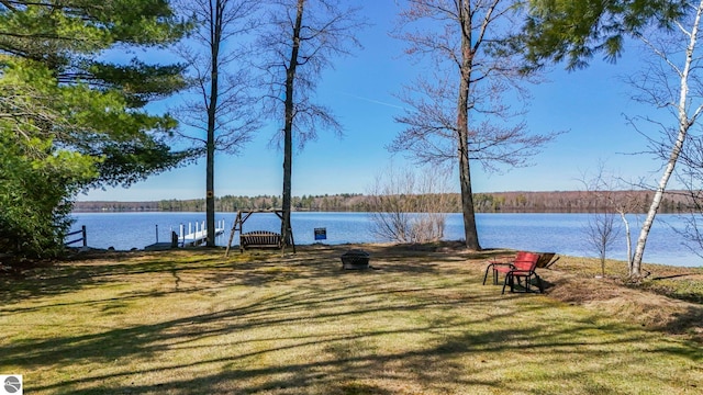5449 E Shore Dr NE, Kalkaska, MI 49646 - water view featuring a boat dock