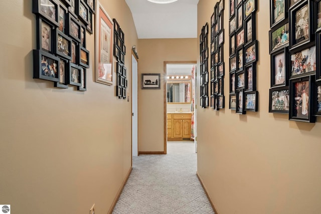 5449 E Shore Dr NE, Kalkaska, MI 49646 - hall with light carpet and baseboards