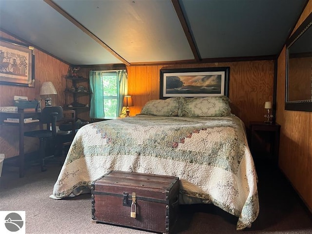 bedroom featuring wooden walls, carpet, and lofted ceiling