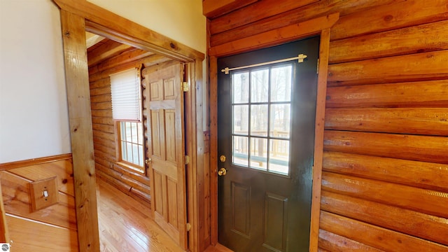 entryway with light wood-style flooring