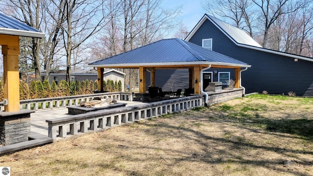 exterior space featuring metal roof