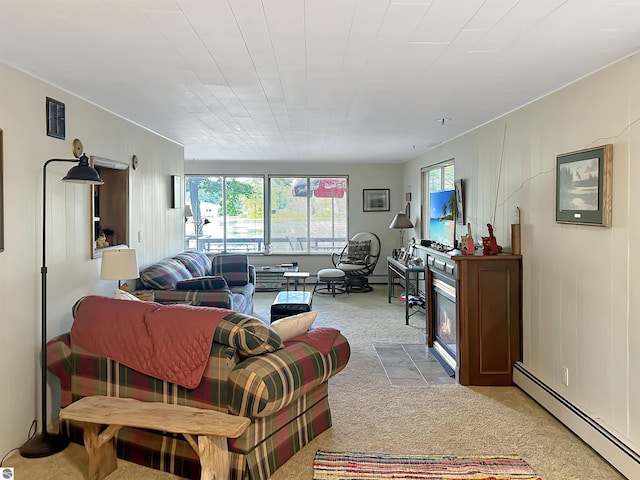 living area with visible vents, a baseboard heating unit, and light colored carpet