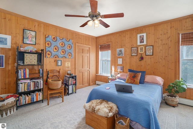 bedroom with wooden walls and carpet flooring