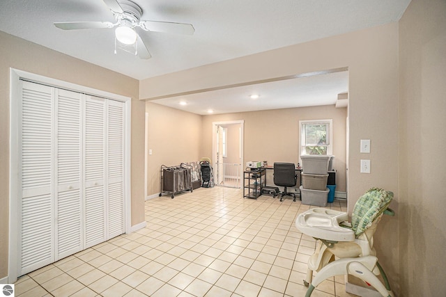 home office with recessed lighting, baseboards, ceiling fan, and light tile patterned floors