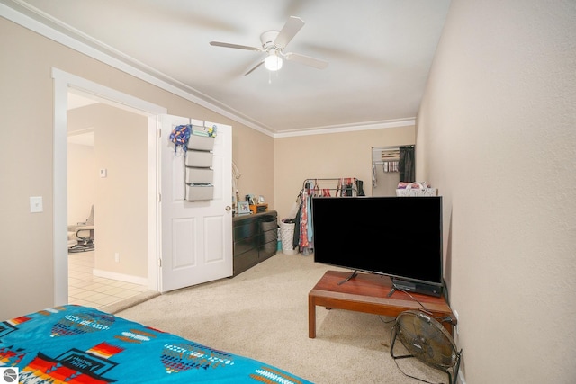bedroom with carpet floors, ceiling fan, and ornamental molding