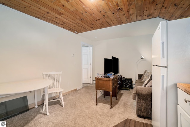 living area with wooden ceiling, baseboards, baseboard heating, and light colored carpet